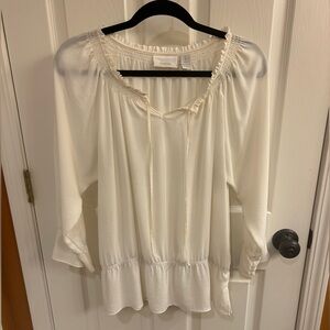Chico’s off white Size 1 top with elasticized waist and sleeves with ruffles.